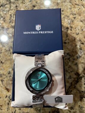 Montres Prestige Women’s Silver Bracelet Watch with Turquoise Dial